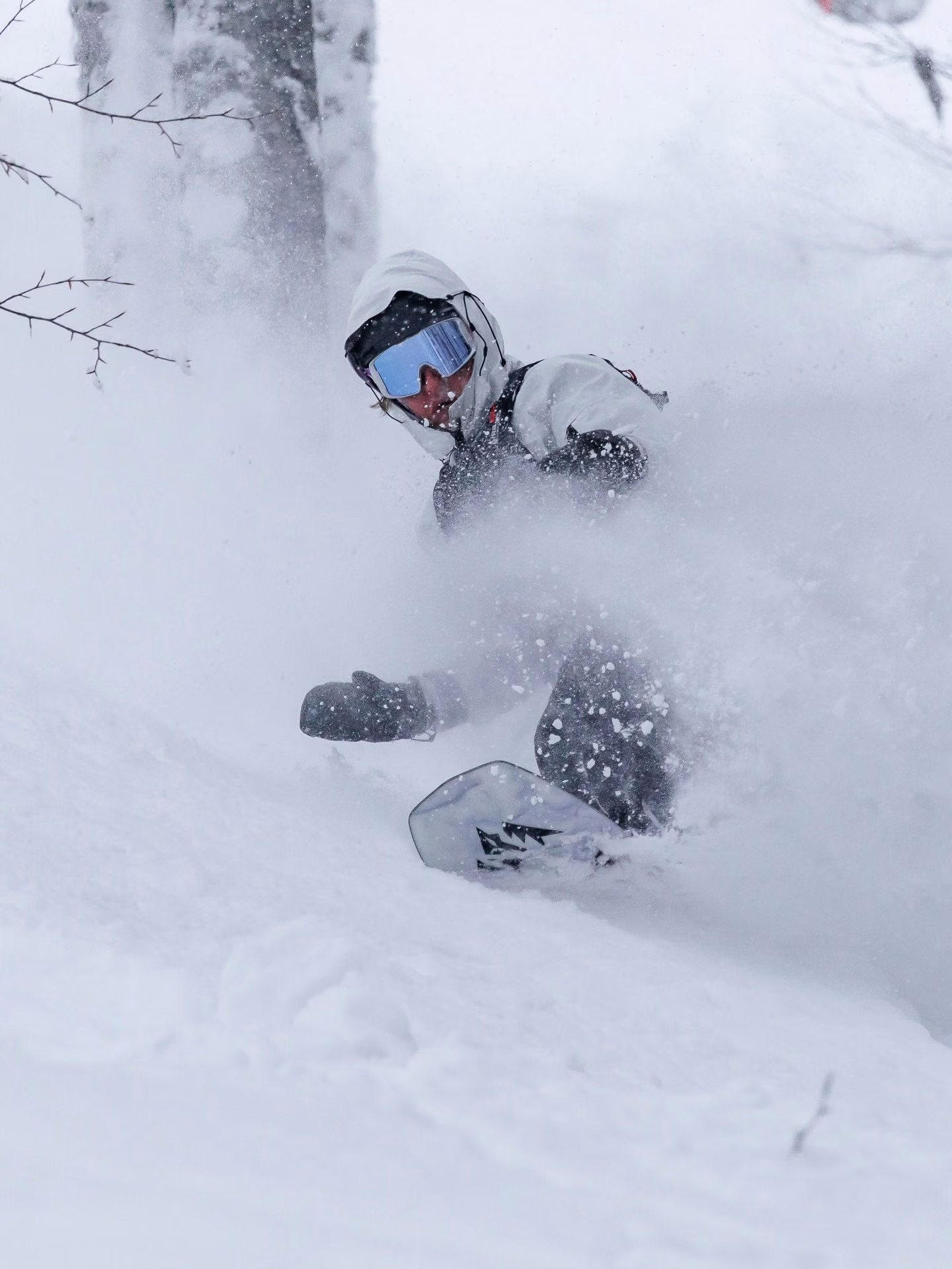Snowboarder in deep Gulmarg powder